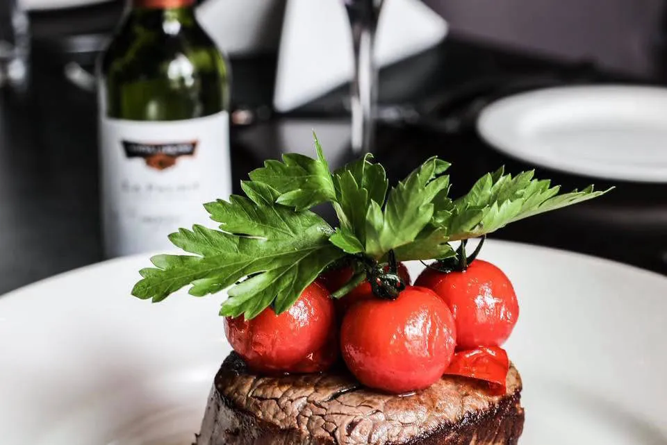 Fillet steak topped with roasted vine tomatoes
